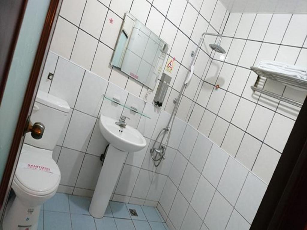 Puti Commercial Hotel Лонгтан Екстер'єр фото