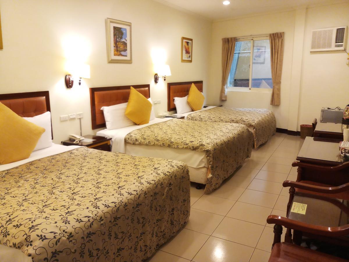 Puti Commercial Hotel Лонгтан Екстер'єр фото