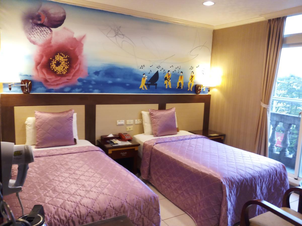 Puti Commercial Hotel Лонгтан Екстер'єр фото