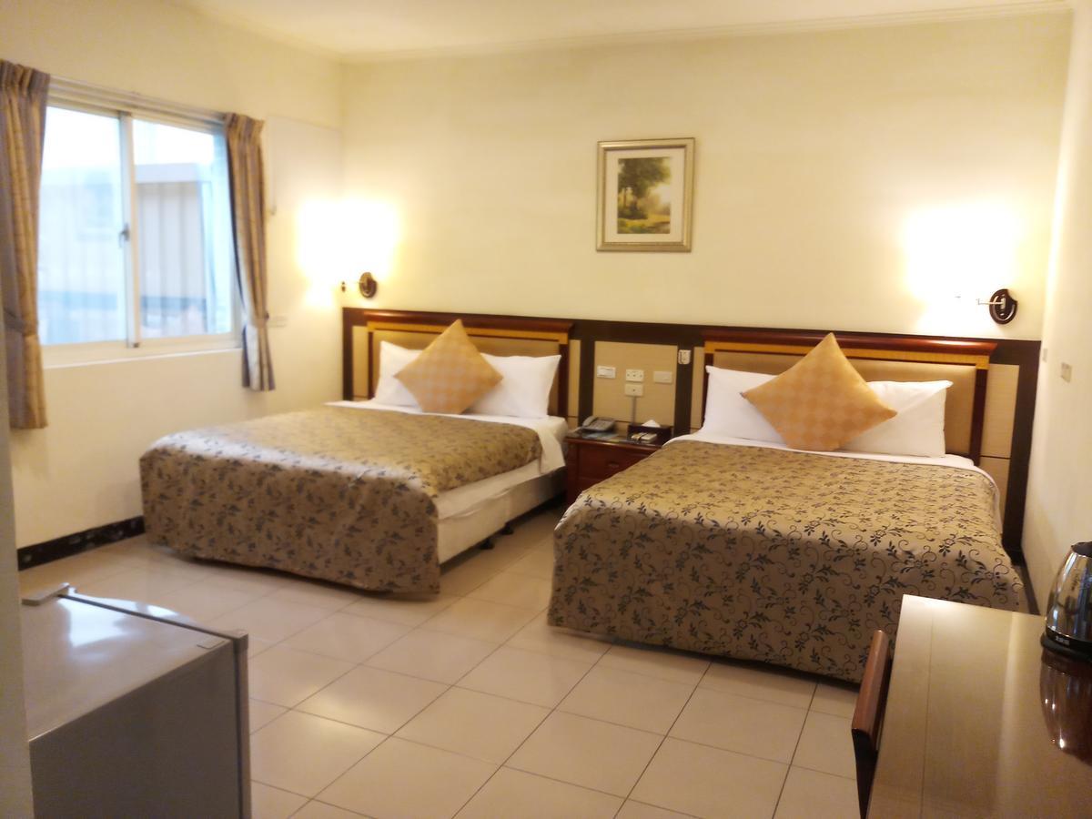 Puti Commercial Hotel Лонгтан Екстер'єр фото